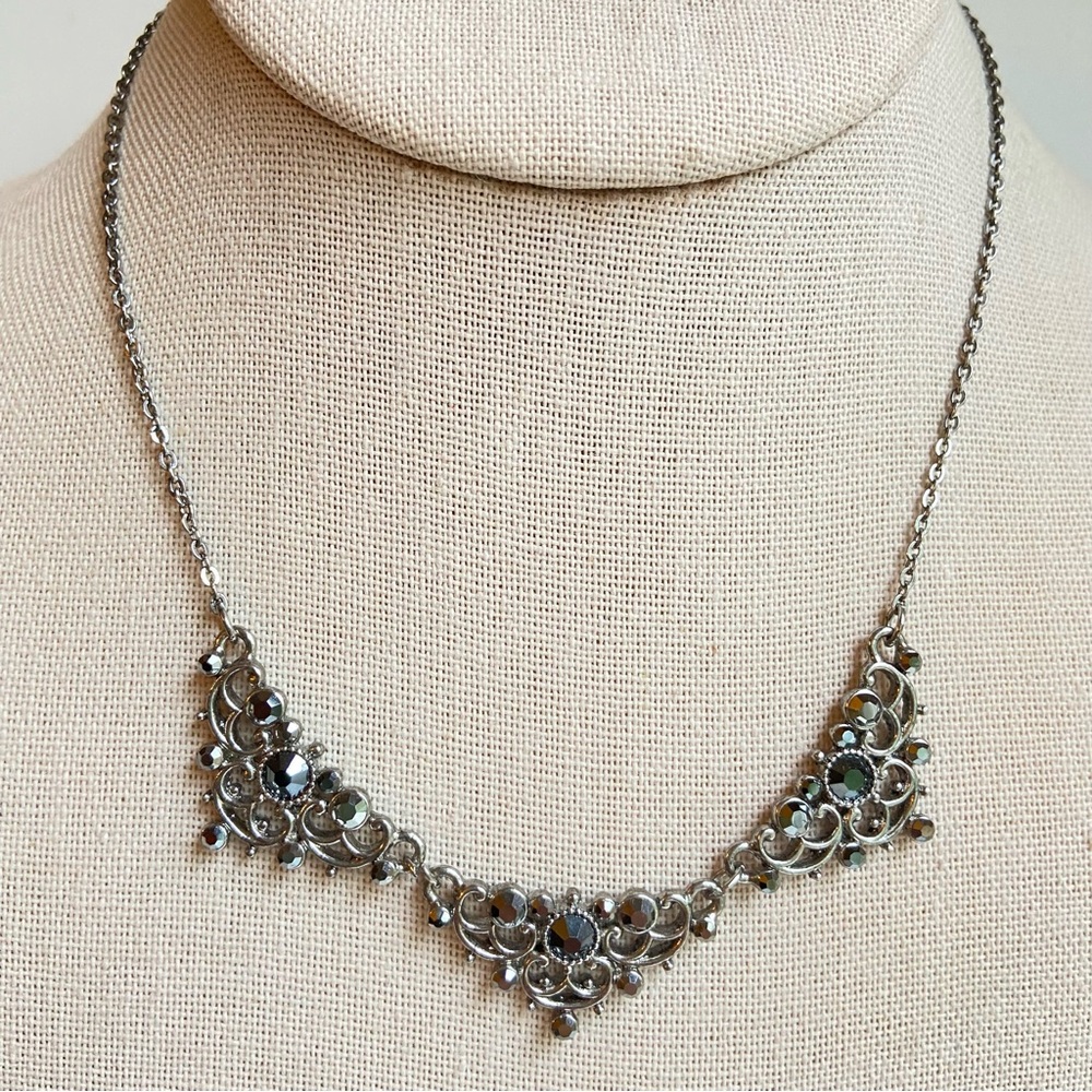 Downton Abbey silvertone segment necklace with dark gray iridescent rhinestones